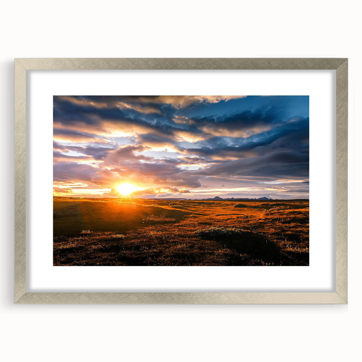 Framed wall art collection showcasing a serene landscape and skyscape design in a sleek silver frame with a mat, perfect for contemporary home decor.