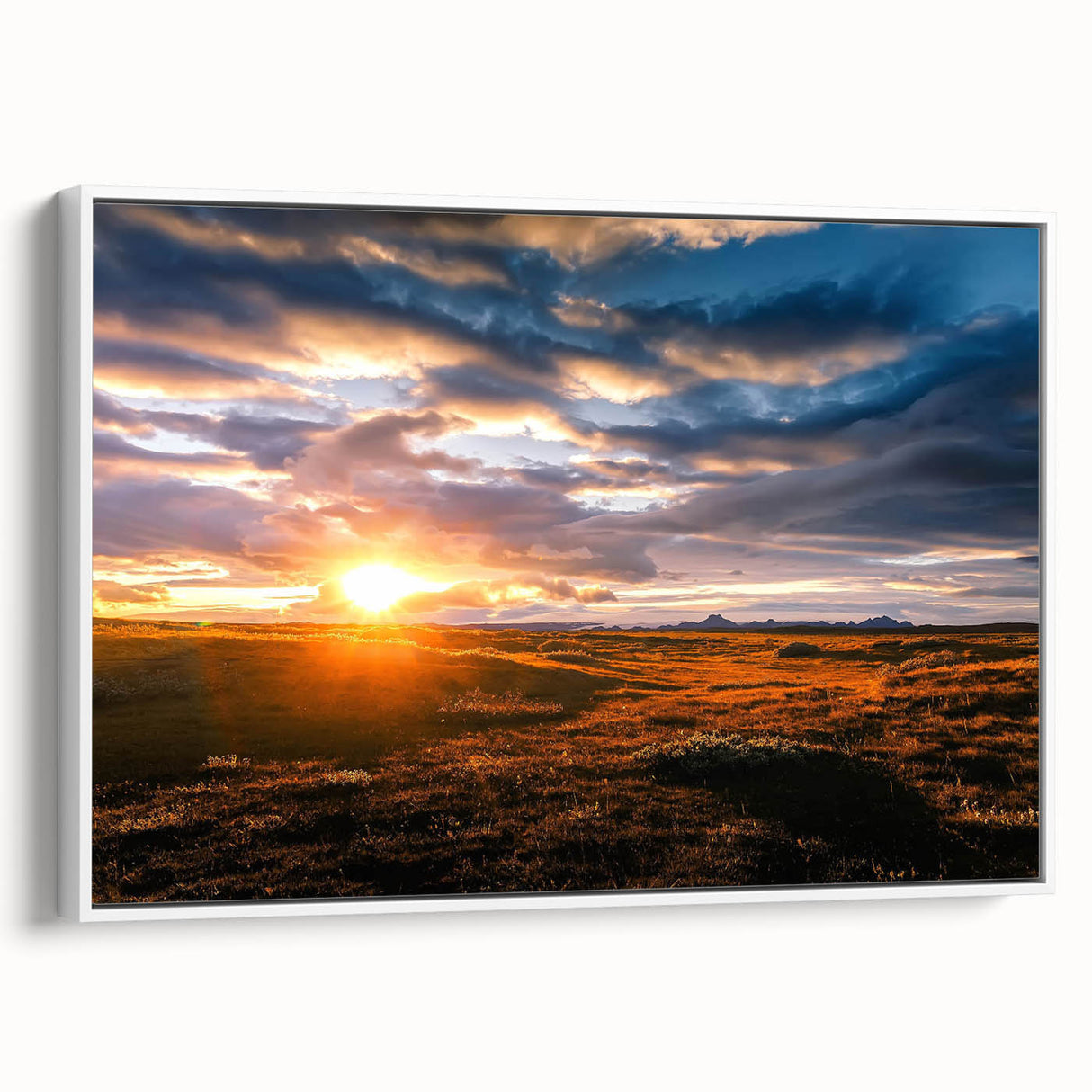 Framed canvas wall art showcasing a serene landscape with soft pastel colors and abstract sky elements, presented in a sleek white frame, ideal for modern decor.