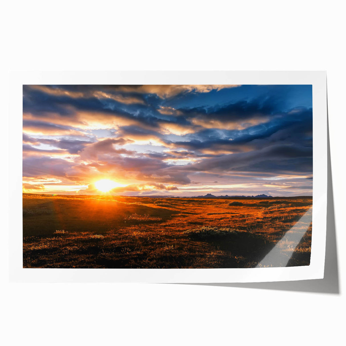 Colorful rolled print showcasing a stunning landscape and skyscape design, ideal for home decor, featuring vibrant hues and intricate details, packaged securely for delivery.