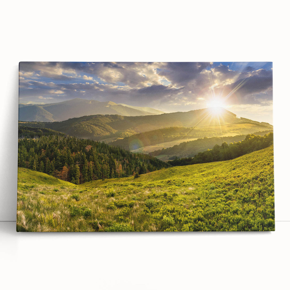Stretched canvas wall art showcasing a vibrant valley landscape design in rich greens and blues, leaning against a wall, perfect for modern home decor.