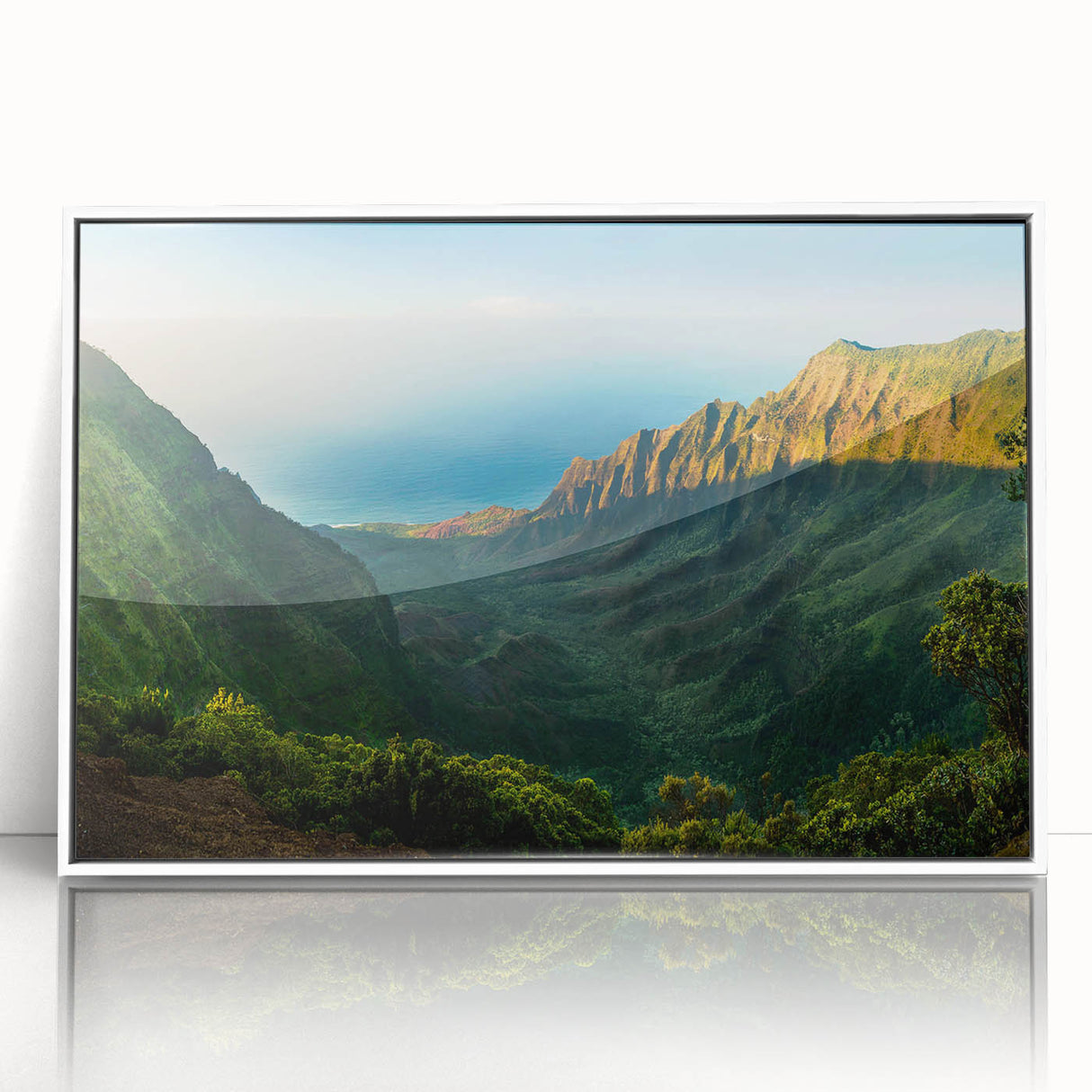 Framed wall art featuring a serene valley landscape design with vibrant colors, encased in a sleek white frame, perfect for home decor and nature enthusiasts.