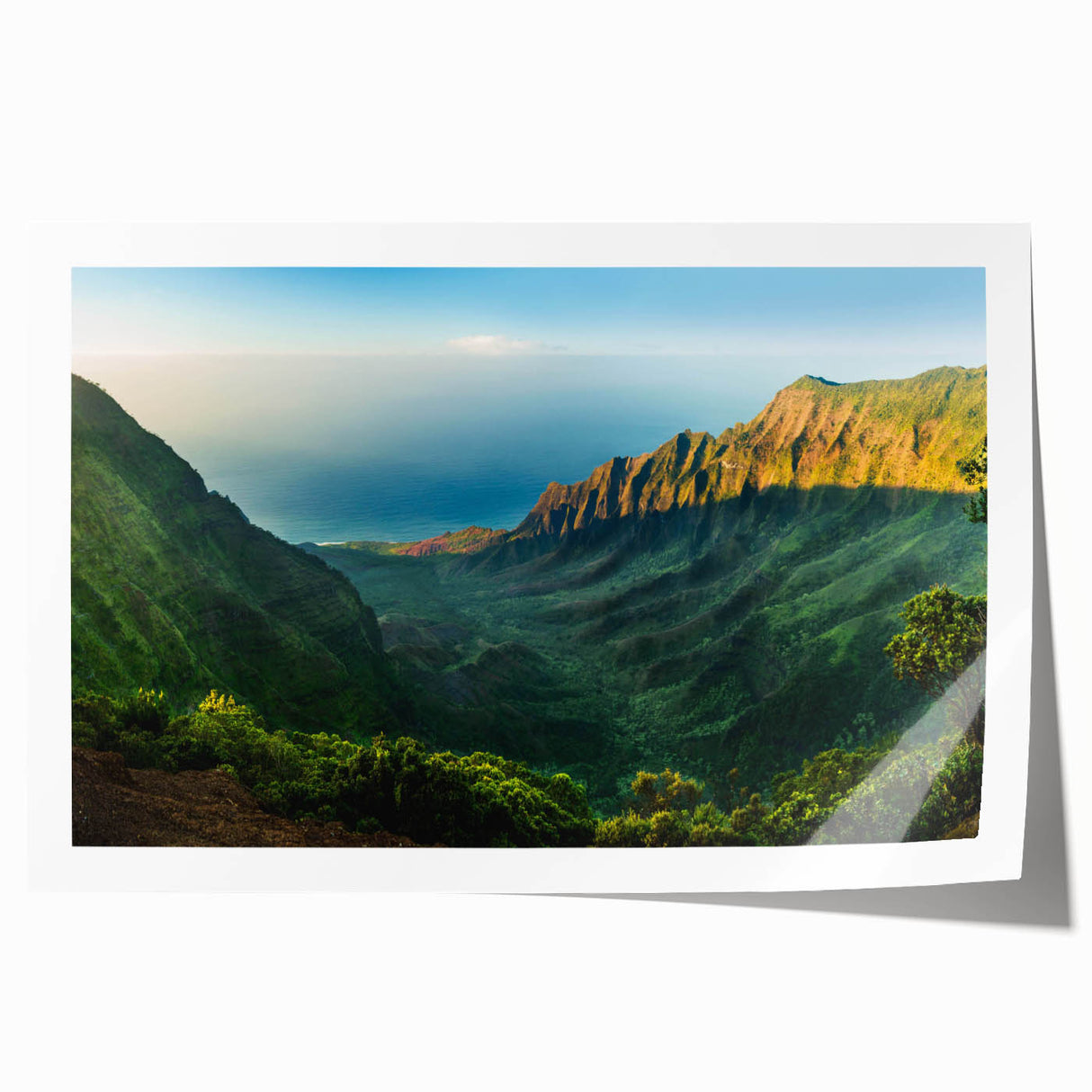 Vibrant landscape wall art print showcasing a serene valley scene with lush greenery and rolling hills, rolled for easy framing and display, perfect for home decor.