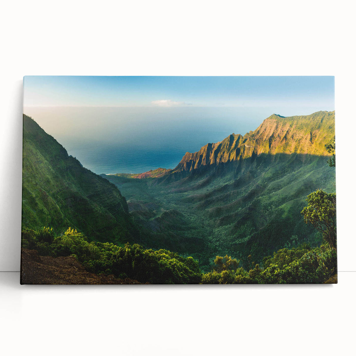 Stretched canvas wall art showcasing a serene valley landscape design, featuring vibrant green hills and a blue sky, perfect for enhancing home decor.