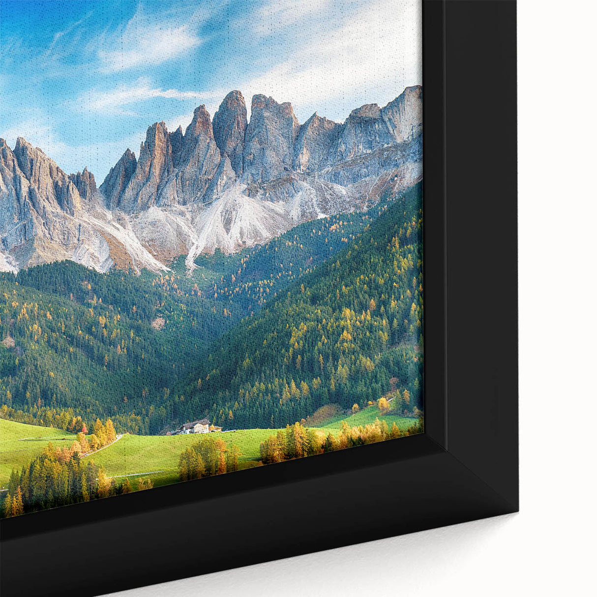 Close-up of a framed canvas wall art piece showcasing a vibrant landscape design of a serene valley, featuring rich colors and intricate details, perfect for home decor.
