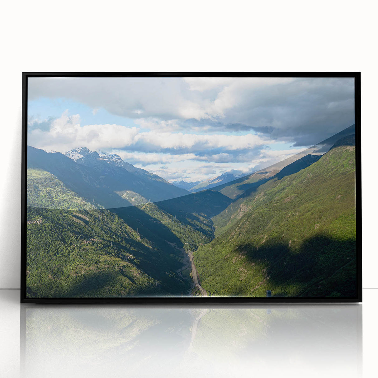 Framed acrylic wall art featuring a serene valley landscape design in vibrant colors, showcasing a black frame and adding a modern touch to home decor. Ideal for nature lovers seeking stylish wall accents.