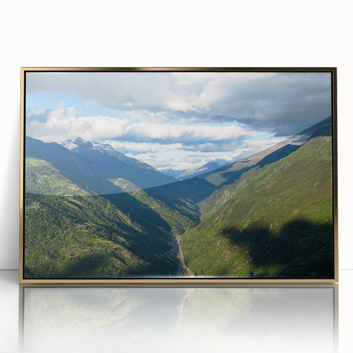 Framed acrylic wall art showcasing a stunning valley landscape design in rich colors, highlighted with a gold frame, perfect for modern home decor.