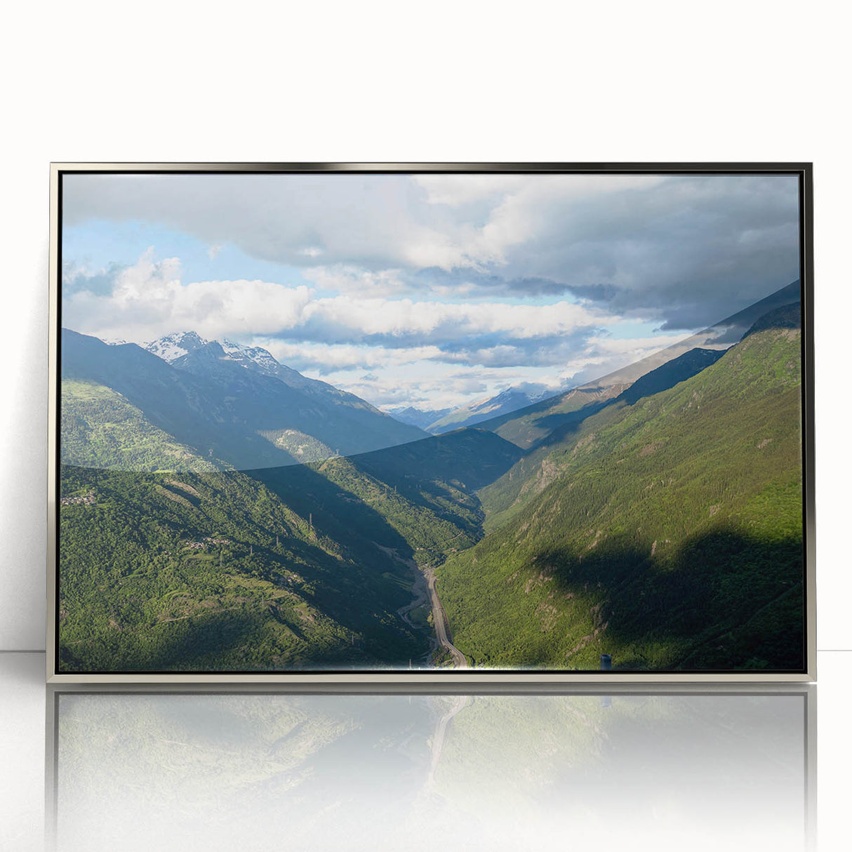 Framed acrylic wall art showcasing a serene valley landscape design with silver accents, perfect for home decor and enhancing visual aesthetics.