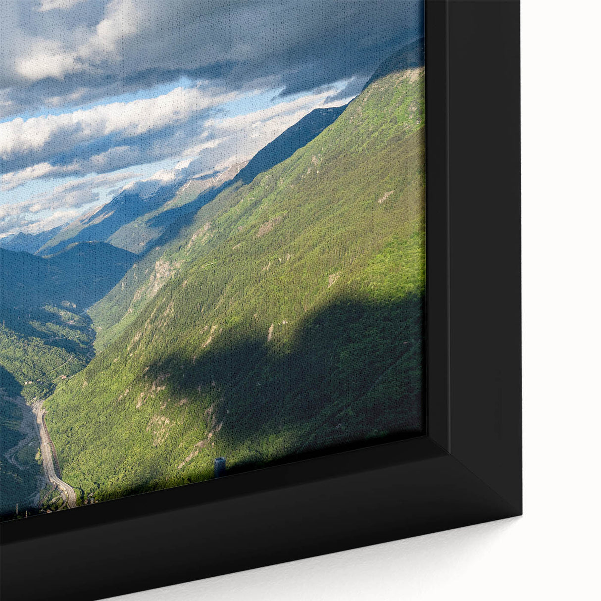 Close-up of a framed canvas wall art collection showcasing a serene valley landscape design with vibrant colors and intricate details, perfect for home decor.