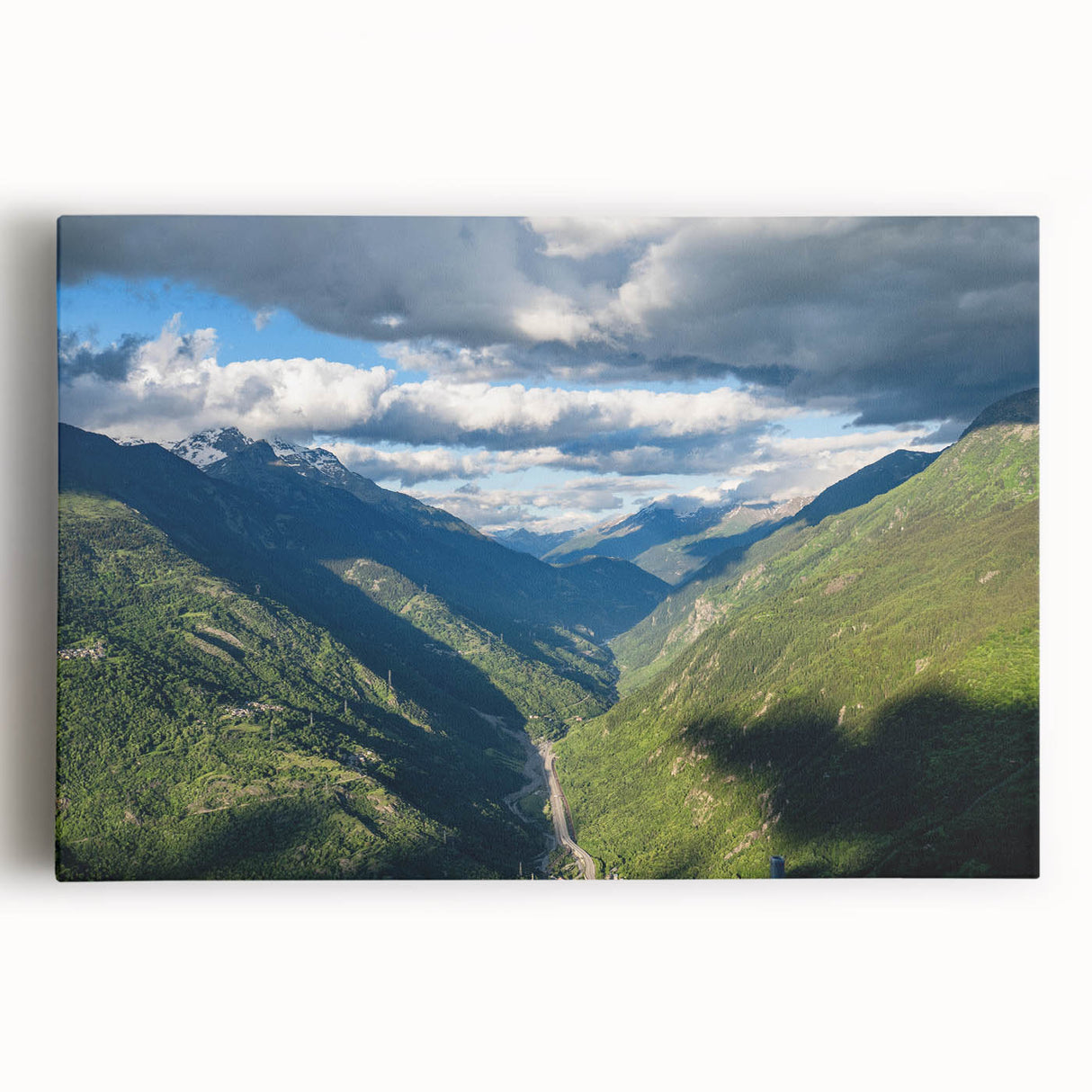 Stretched canvas wall art showcasing a vibrant valley landscape design with rich colors and intricate details, perfect for enhancing home decor.