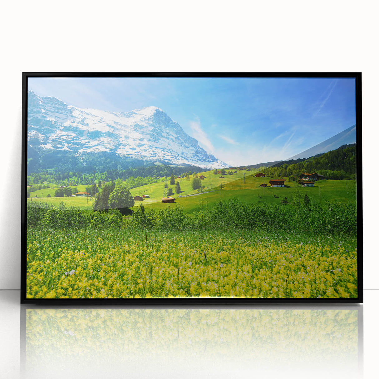 Framed artwork of a serene valley landscape, featuring lush green hills and a clear blue sky, with a sleek black frame enhancing its contemporary look. Perfect for home decor enthusiasts seeking nature-inspired wall art.