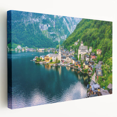Stretched canvas wall art depicting a vibrant village landscape scene, showcasing colorful houses and lush greenery, ideal for home decor enhancement.