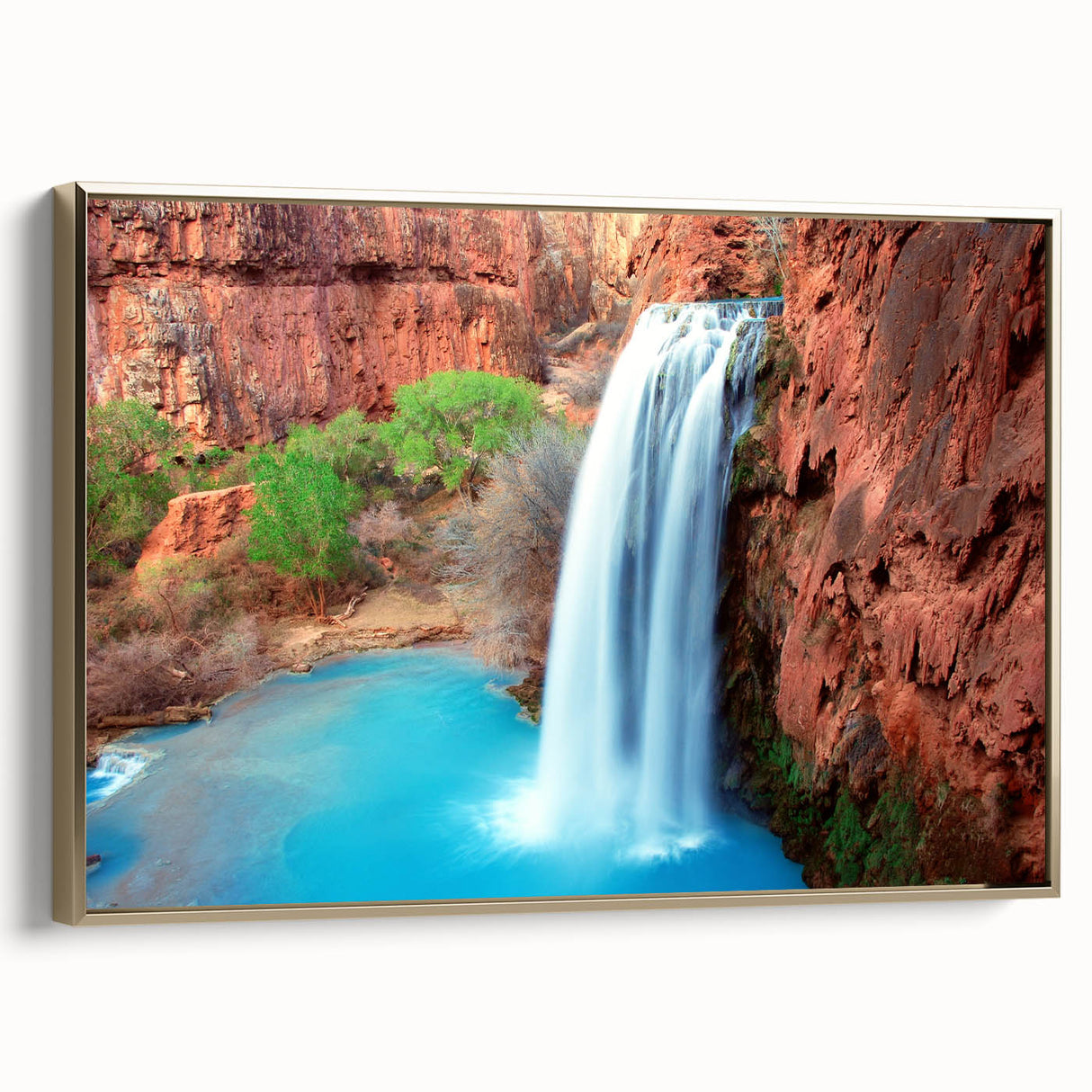 Framed canvas wall art showcasing a stunning waterfall landscape with vibrant colors, gold frame accents, perfect for enhancing home decor aesthetics.