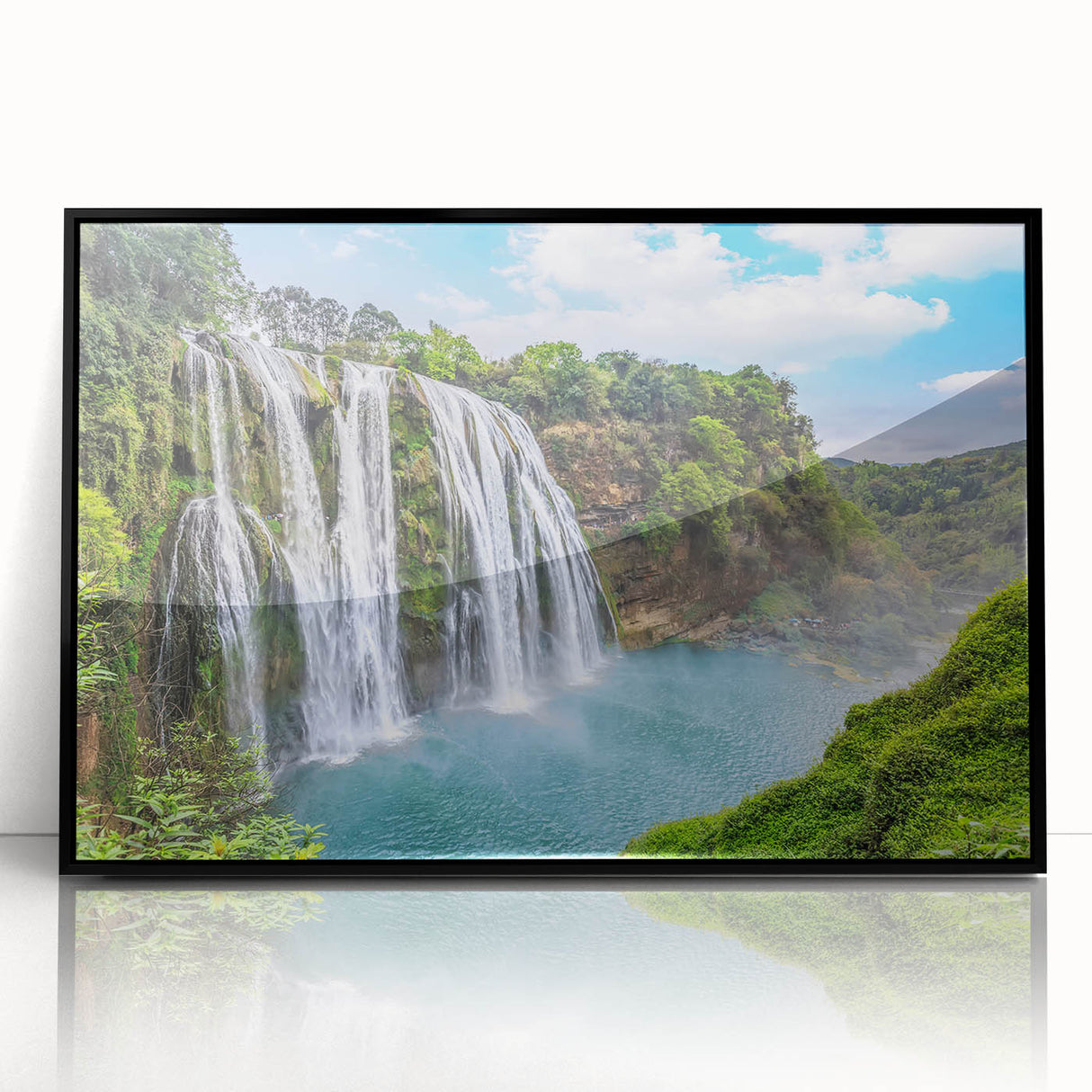 Framed acrylic wall art showcasing a stunning landscape waterfall design, featuring vibrant colors and a sleek black frame, perfect for modern home decor.