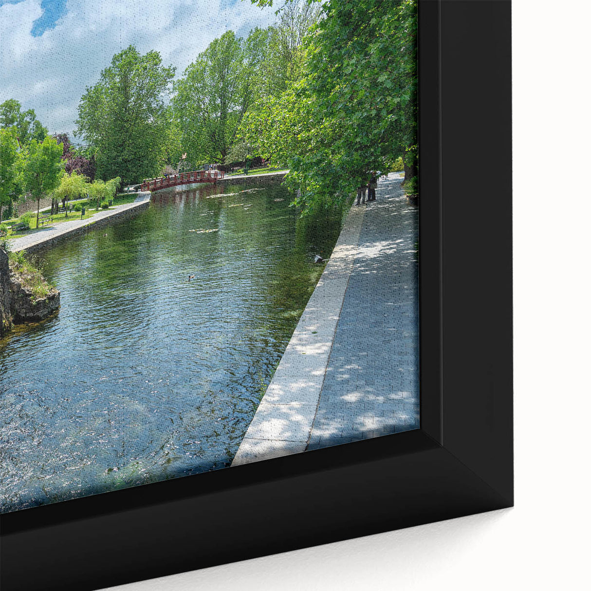 Framed canvas wall art showcasing a close-up of a serene watermill landscape design, featuring vibrant colors and intricate details, perfect for home decor.