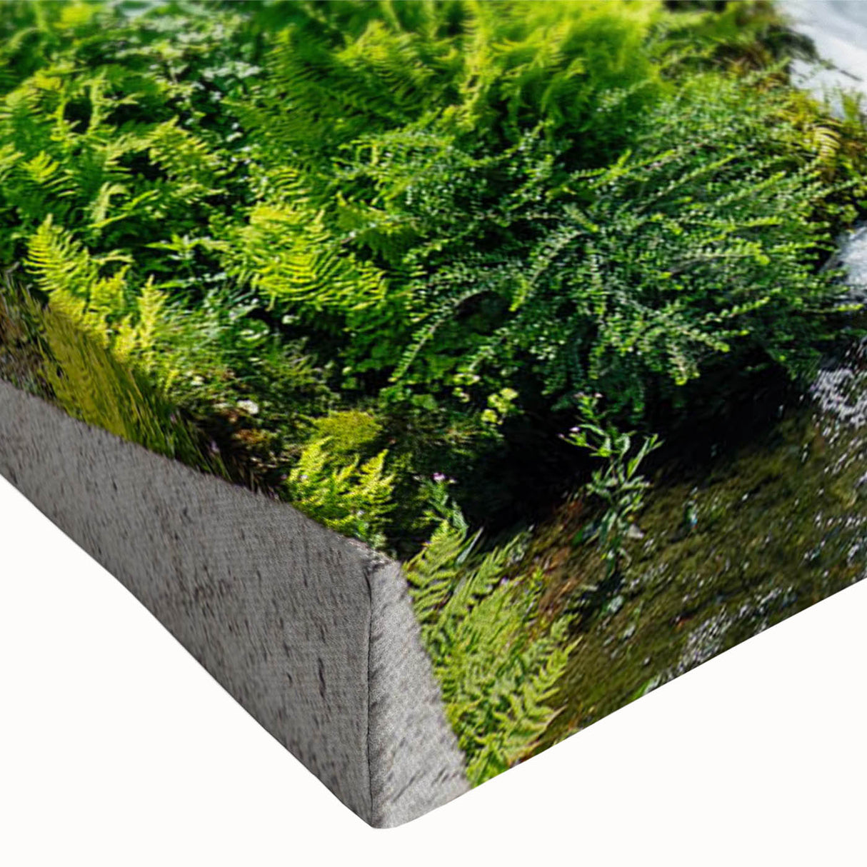 Close-up of a stretched canvas wall art piece showcasing a serene watermill landscape design. The artwork features vibrant colors and intricate details, perfect for home decor or office spaces.