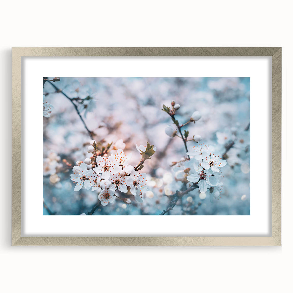 Textured art print of abstract florals in soft pastel colors, framed in silver, ideal for bedroom wall decor.