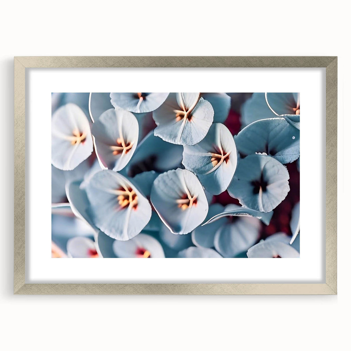 Textured art print of abstract florals in soft pink and white hues, framed in silver, ideal for bedroom wall decor.