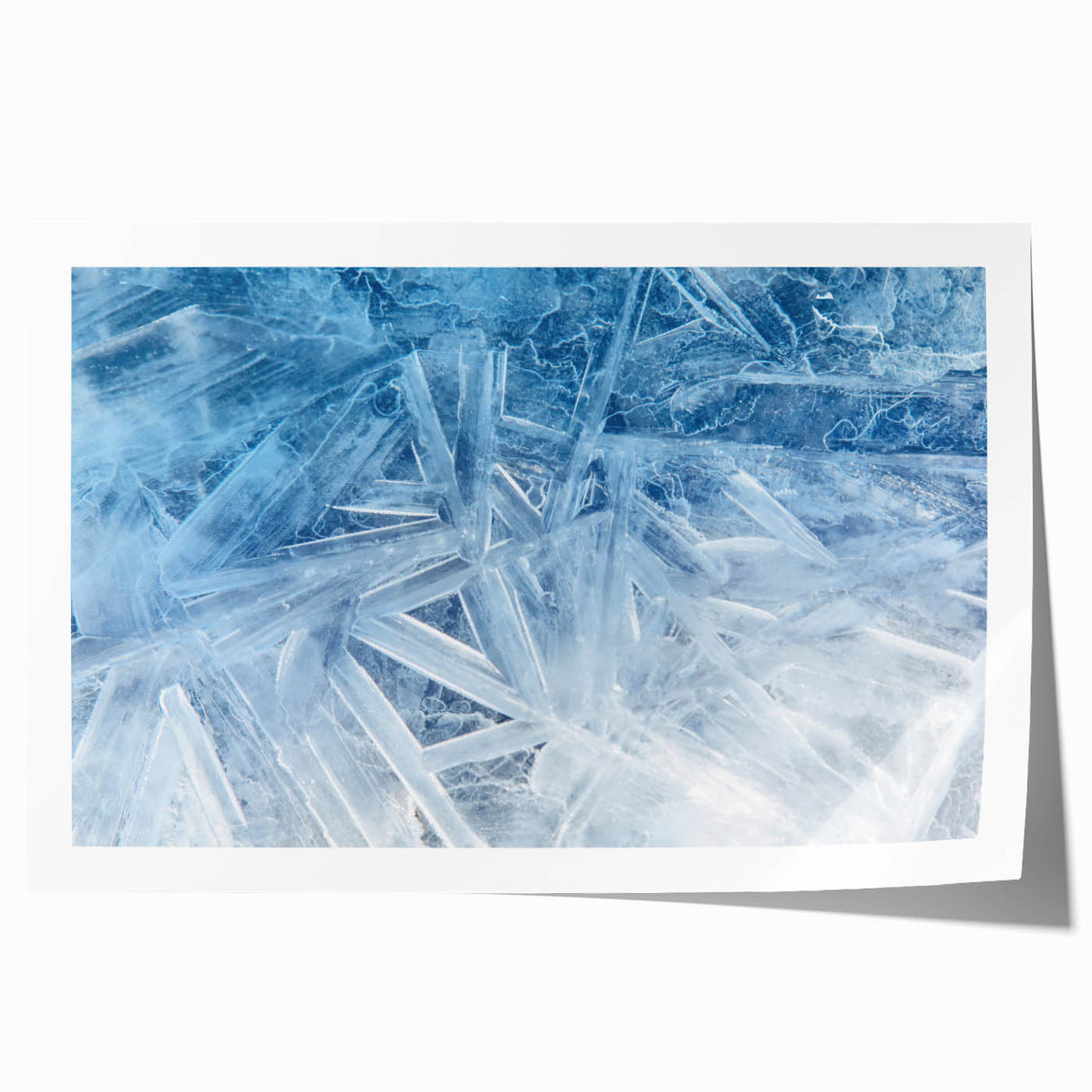 Close-up of frost patterns on ice in muted blue and white tones, rolled print, suitable for art wall dining room.