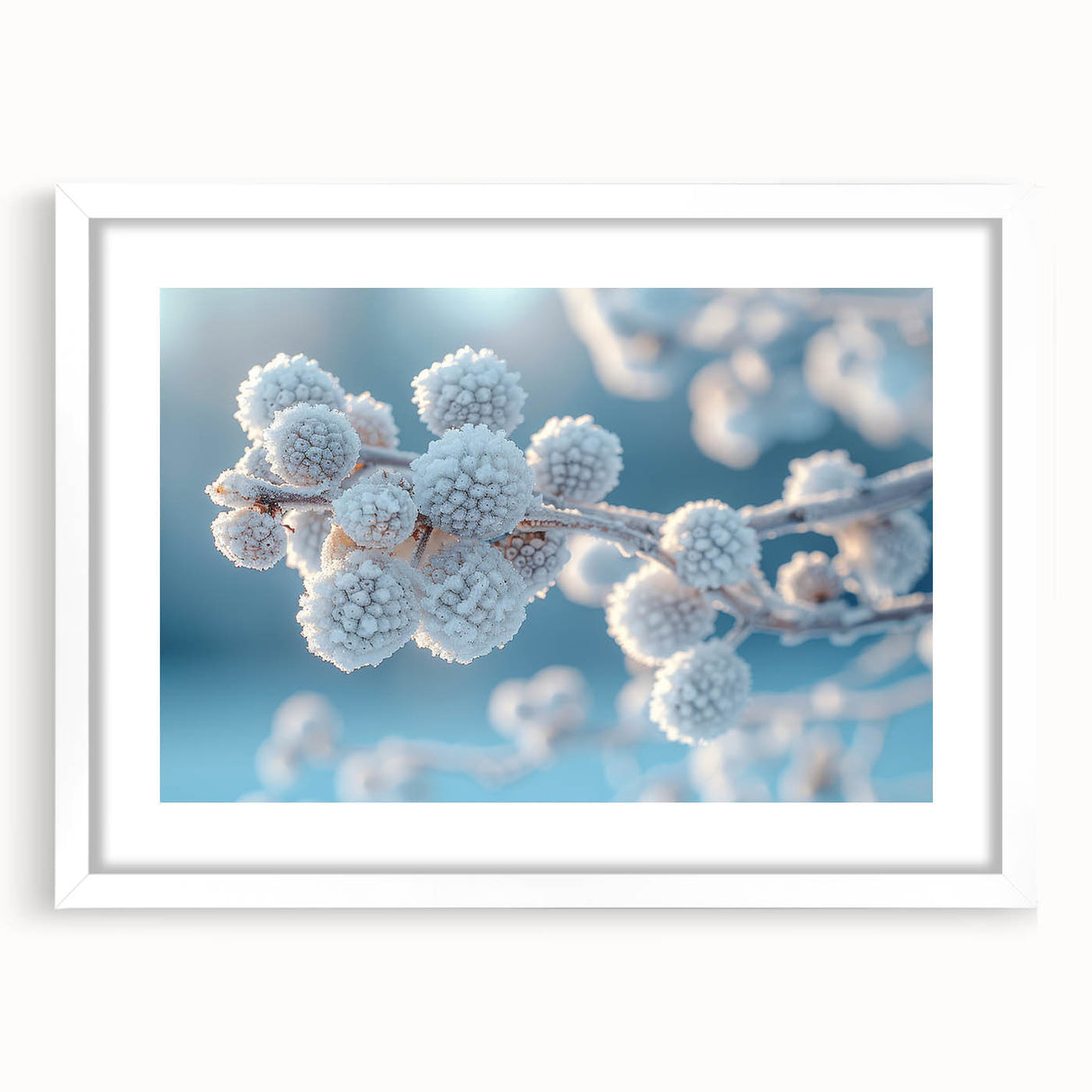 Frost pattern abstract art print in muted blue and white, framed with a white mat.