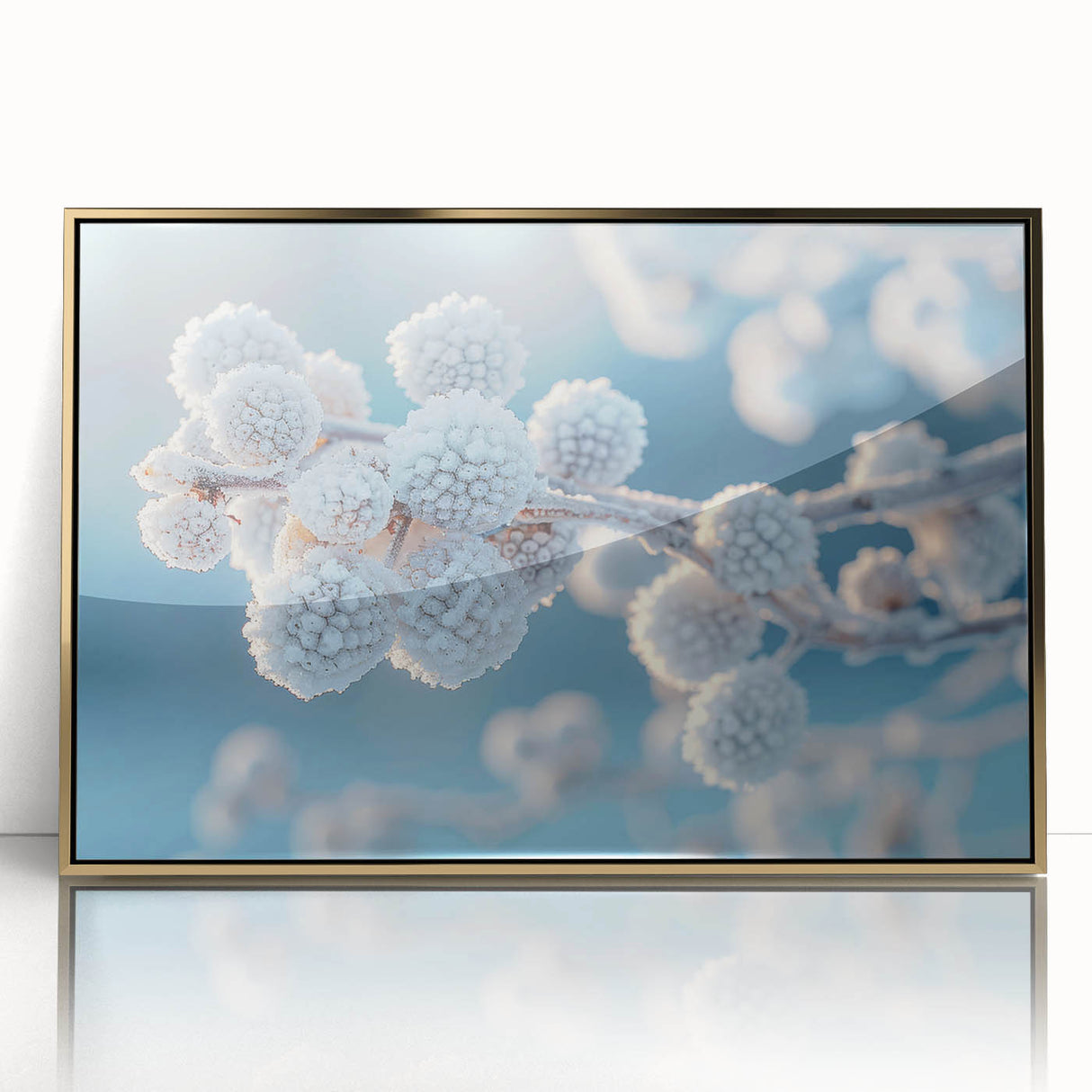 Mid-century modernist art of a frost design in gold framed acrylic, with cool blue tones, ideal for nursery wall art.