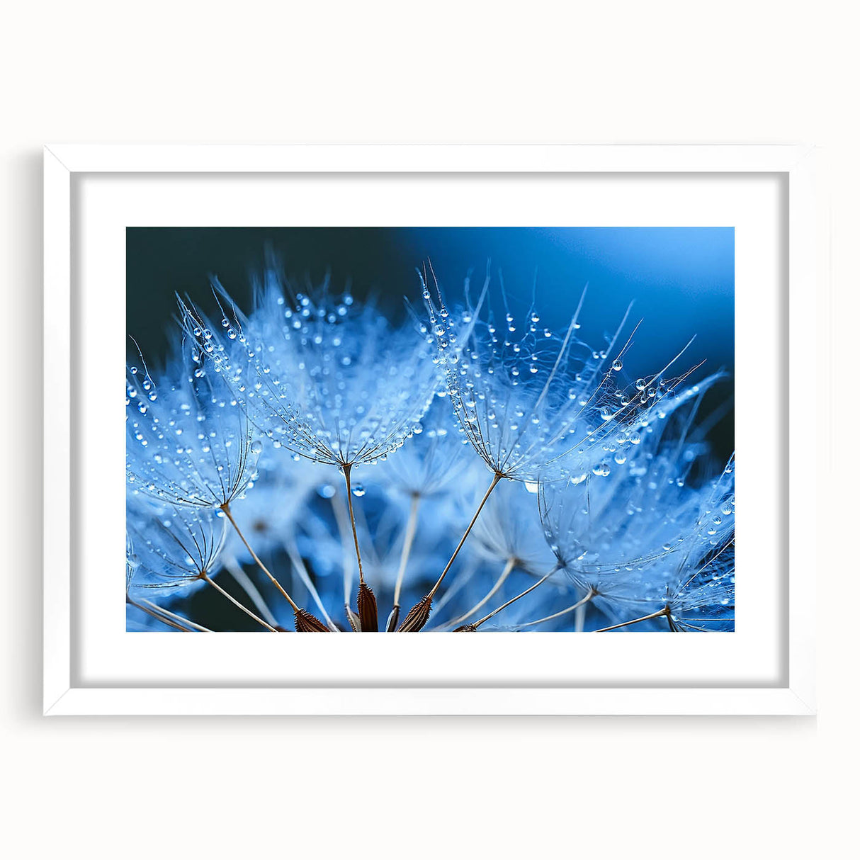 Abstract art print featuring swirling blue and white patterns, framed in white, suitable for bedroom or dining room decor.