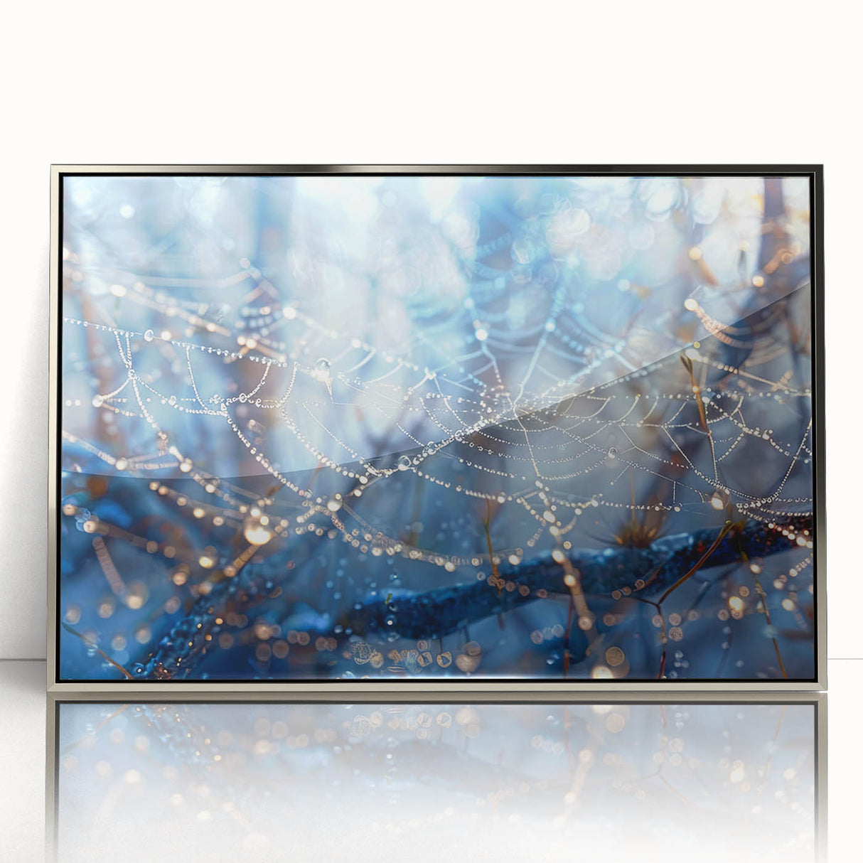 Mid-century modernist art featuring a close-up water design in silver and blue tones on framed acrylic.