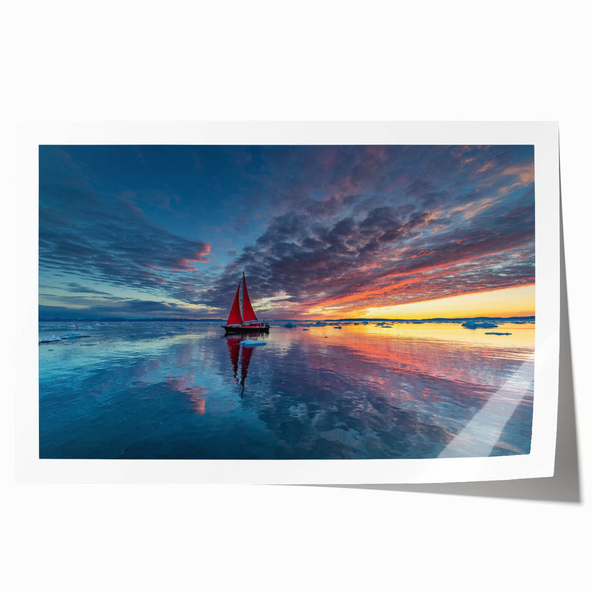 Rolled print of a sailboat on calm waters, in muted blue and gray tones, suitable for dining room wall art.