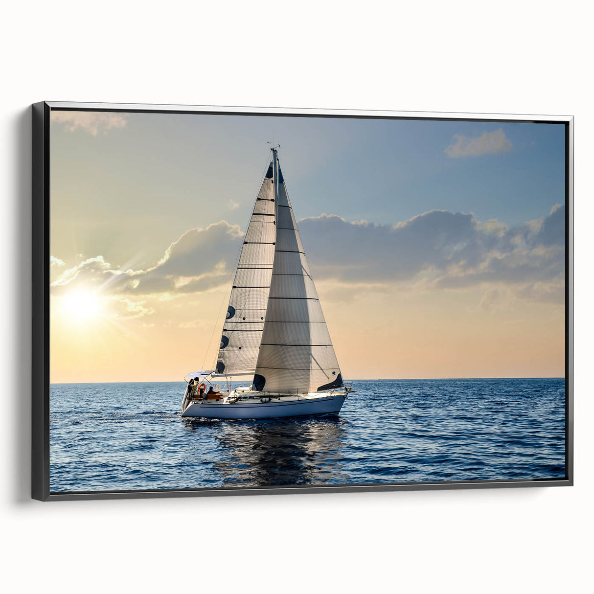 Framed canvas featuring a black and white vintage sailboat, ideal for bedroom wall decor.