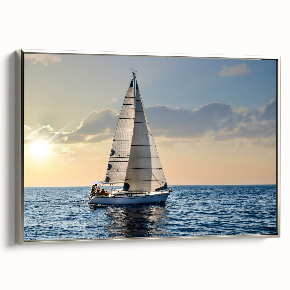 Vintage poster art of a sailboat on a silver-framed canvas, featuring a black and colorful palette.