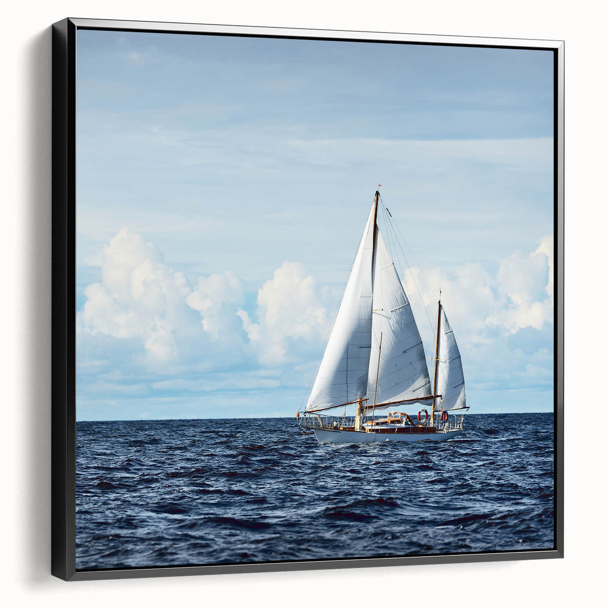 Black and white framed canvas of a vintage sailboat on calm waters, ideal for bedroom wall art.