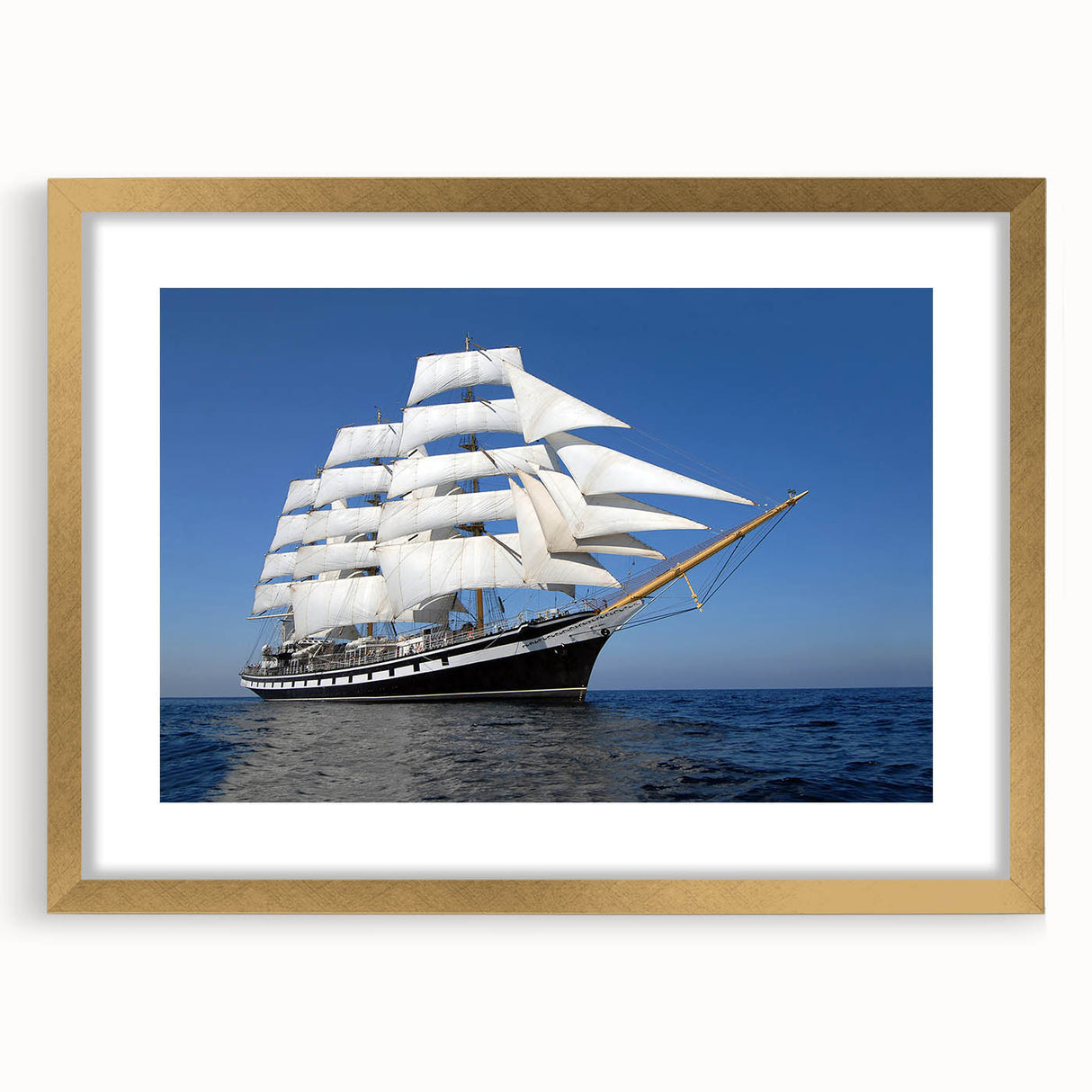 Extra large abstract art print of a stylized ship, featuring textured gold and blue tones on a framed canvas.