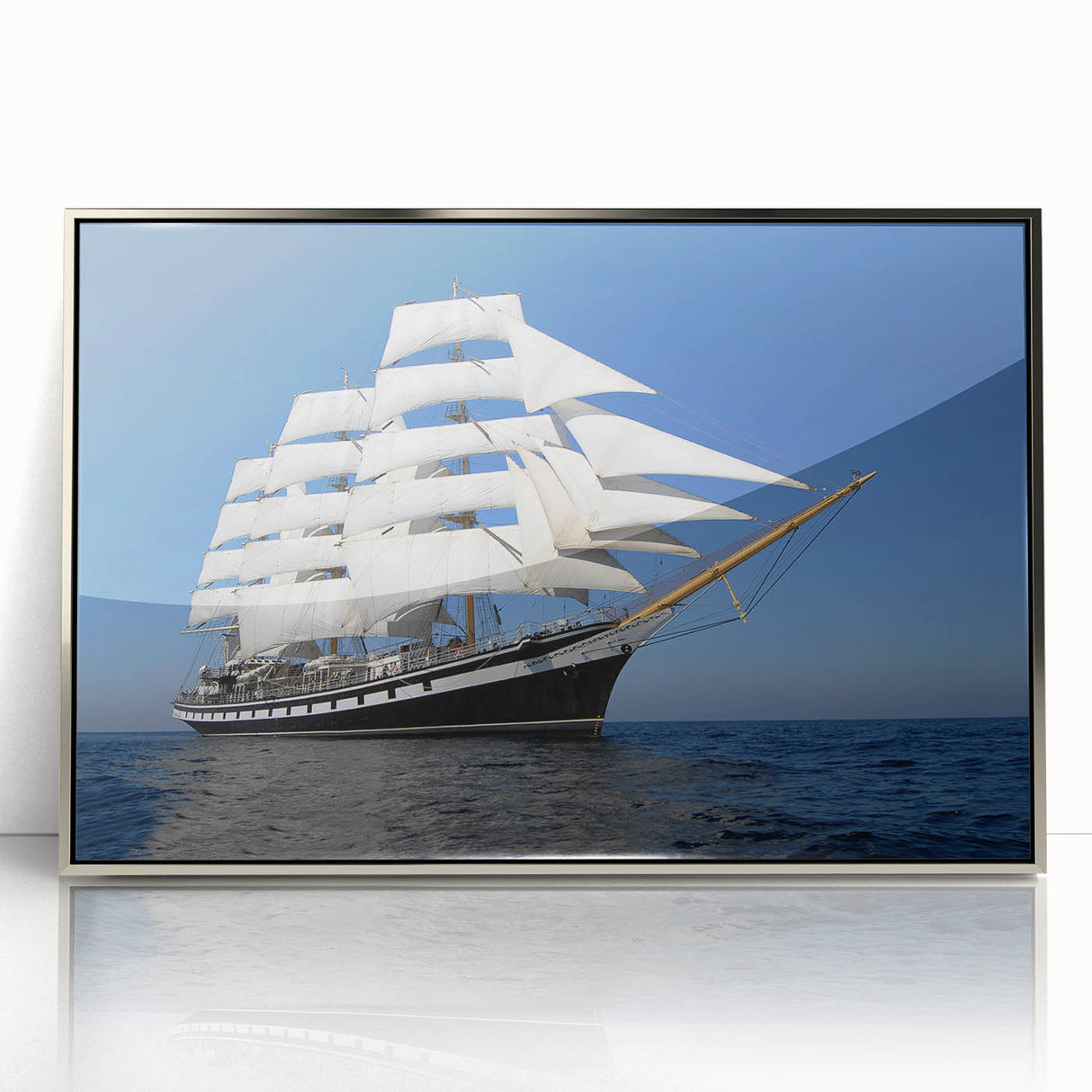 Mid-century modernist art depicting a stylized ship in silver and blue tones on a framed acrylic.