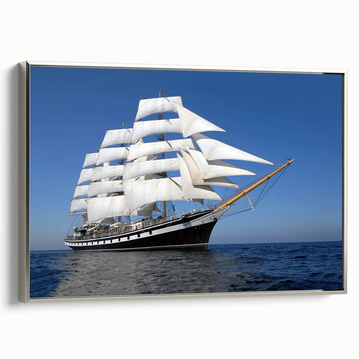 Framed canvas of a vintage ship in black with colorful accents, ideal for office or study wall decor.