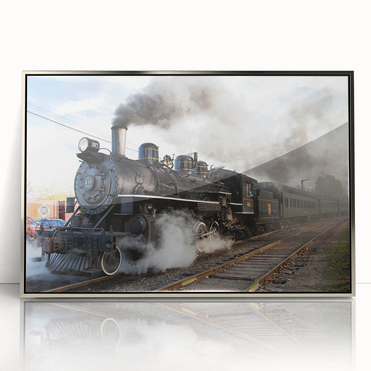 Mid-century modernist train illustration in muted gray, acrylic print framed in silver, suitable for nursery wall art.