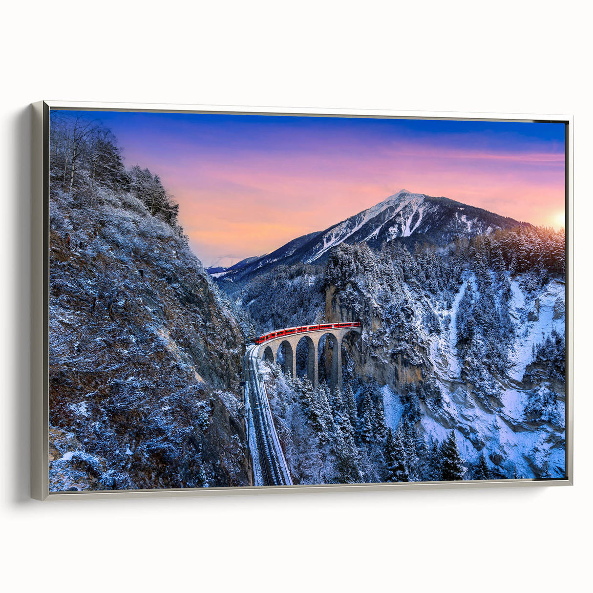 Framed canvas depicting a vintage train in a colorful landscape, ideal for enhancing a home office or living room decor.