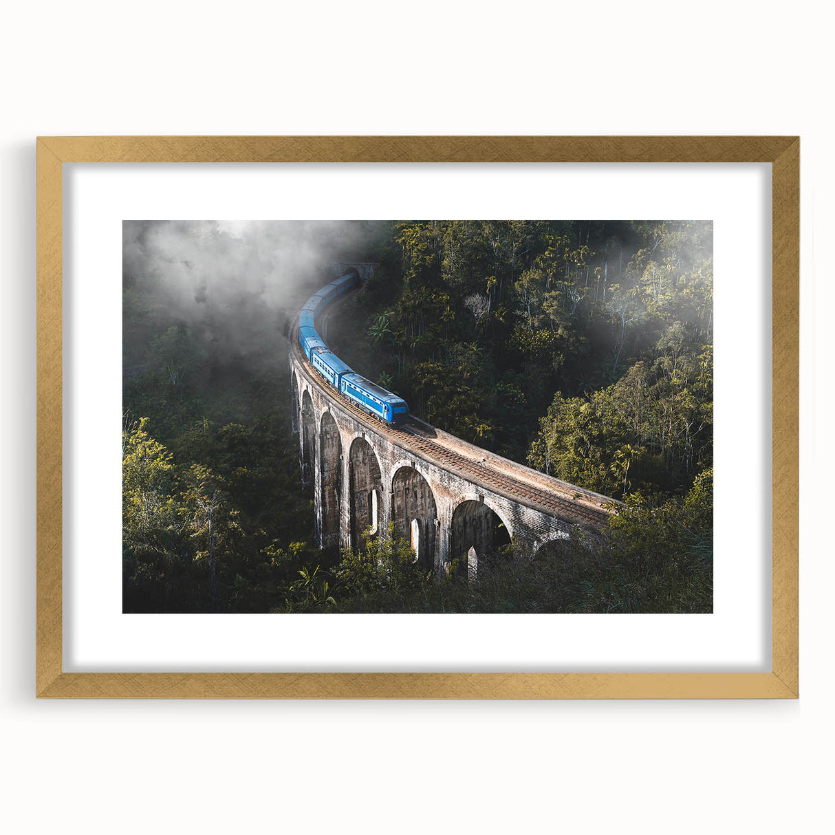 Extra large abstract art print of a train, in muted earth tones on a textured canvas, framed in gold.