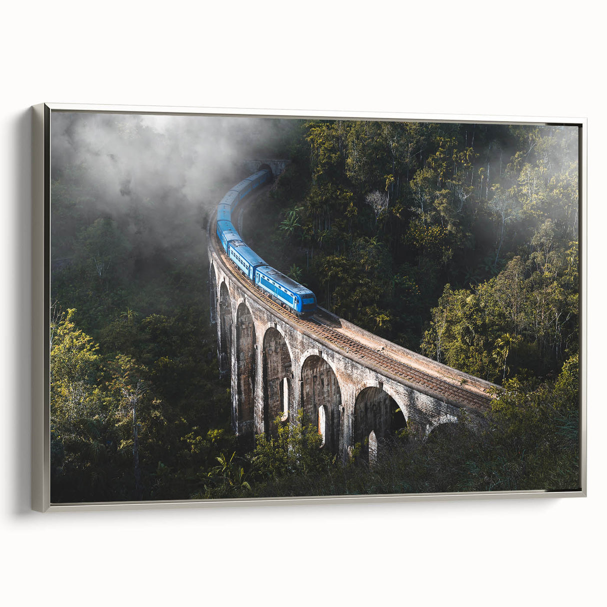 Framed canvas of a vintage train in a colorful landscape, ideal for decorating a home office.