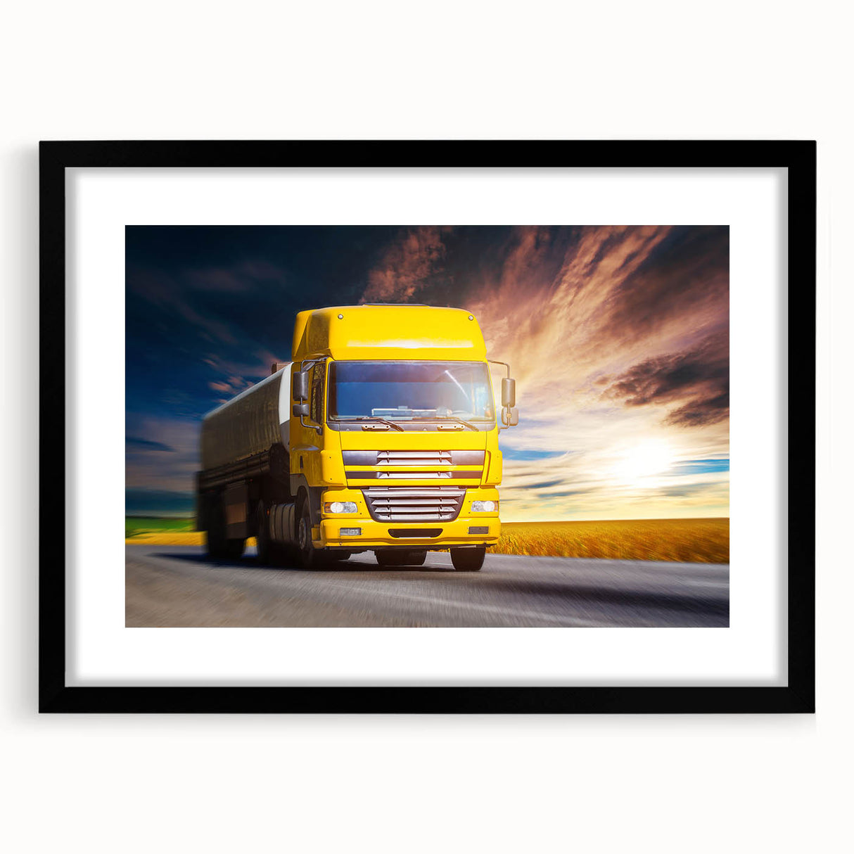 Abstract art print of colorful, textured trucks on a large canvas, framed in black, suited for living room decor.