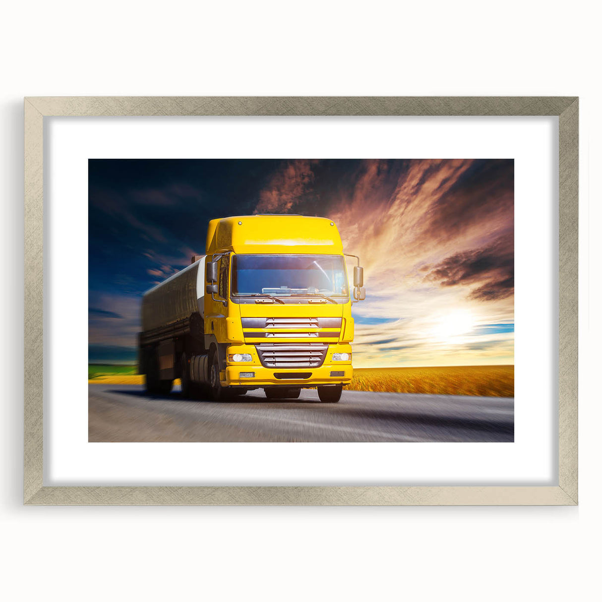 Textured art print of abstract trucks in neutral tones on a framed silver mat, suitable for bedroom decor.