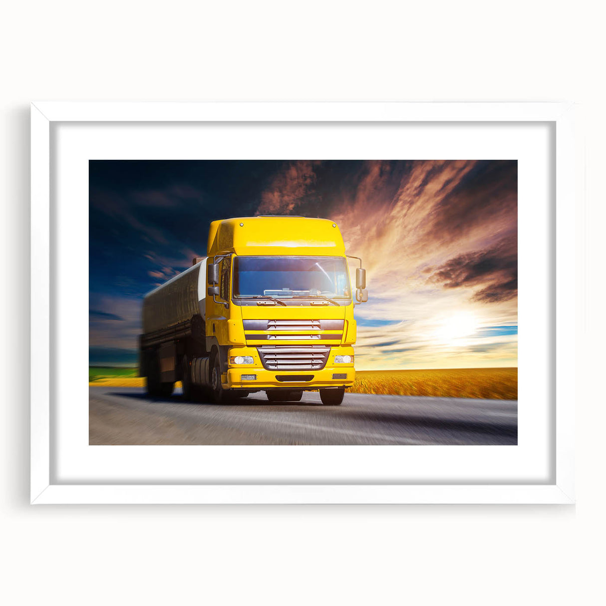 Abstract art print of colorful trucks in a row, framed in white, suitable for dining room decor.