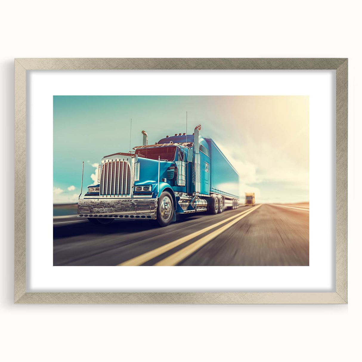 Textured art print of abstract trucks in muted gray and blue tones, framed in silver, ideal for bedroom wall decor.