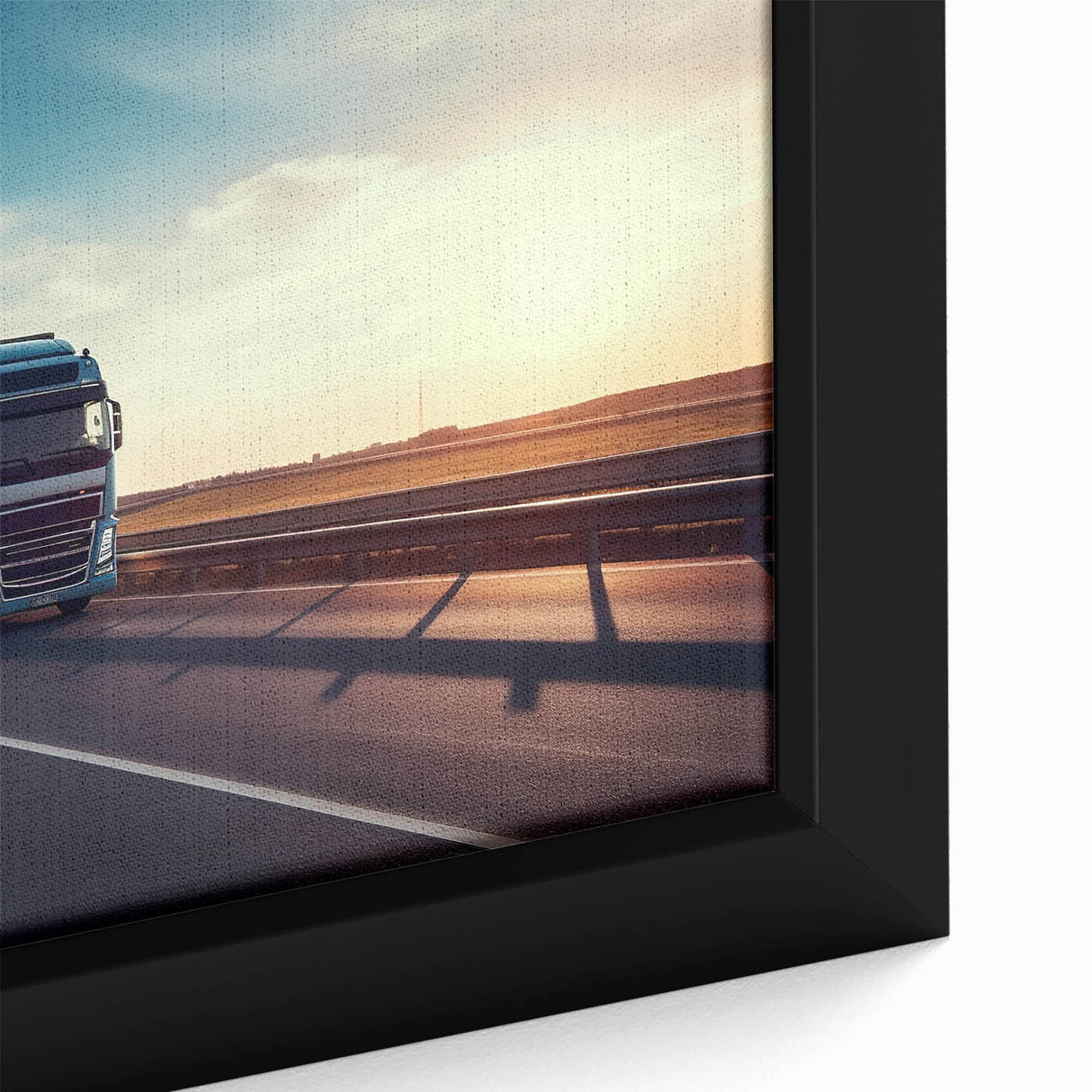 Extra large framed canvas featuring a close-up of colorful, textured trucks on a black background.