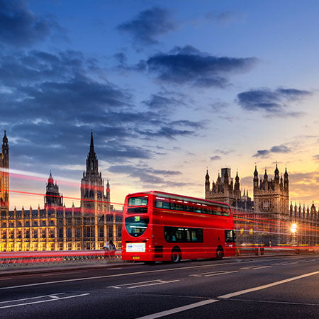 Service vehicles wall art featuring a red double-decker London bus crossing Westminster Bridge at sunset — Service Vehicles Wall Art Collection for urban and travel decor.