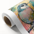 Rolled canvas showcasing vibrant African tribal wall art with intricate patterns, packaged securely in a protective cardboard tube for safe shipping and display.
