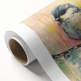Rolled canvas showcasing vibrant African tribal art with intricate patterns and rich colors, securely packaged in a durable cardboard tube for safe shipping.