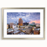 Textured abstract art print in muted gray and blue tones on canvas, suitable for modern bedroom decor.