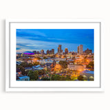 Abstract art print featuring swirls of blue and gray on canvas, suitable for modern bedroom or dining room decor.