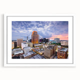 Abstract art print featuring swirling blue and gray tones on canvas, suitable for dining room or bedroom decor.