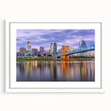 Abstract art print in vibrant orange and blue tones on canvas, suitable for dining room decor.