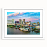 Abstract art print featuring swirling blue and gray tones on canvas, suitable for modern dining room decor.